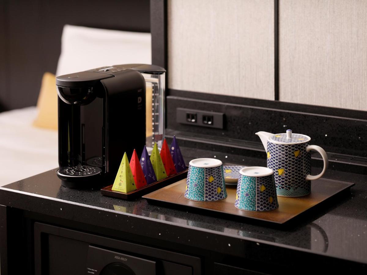 The Hotel Sanraku Kanazawa 21Th December 2022 Open Экстерьер фото A Nespresso coffee machine in a hotel room
